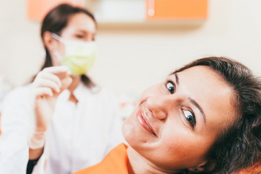 Patient in Argyle smiling before dental implants