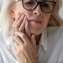 woman with mouth pain